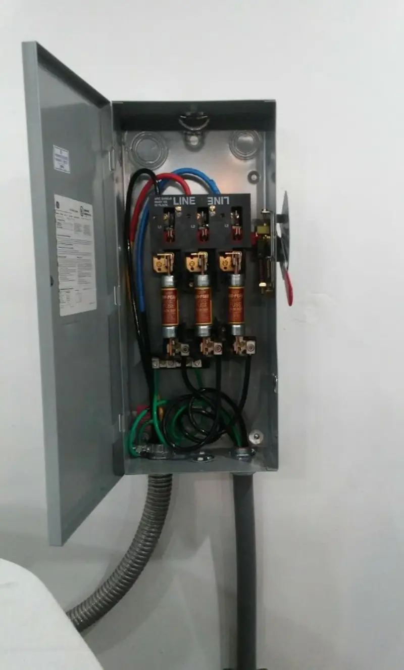 Three-phase disconnect switch installed for Smoke Detector Installation in Goodland